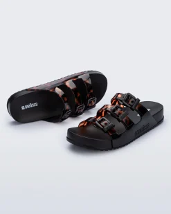 Slides*Melissa Cozy Stripes Black/Clear Tortoise